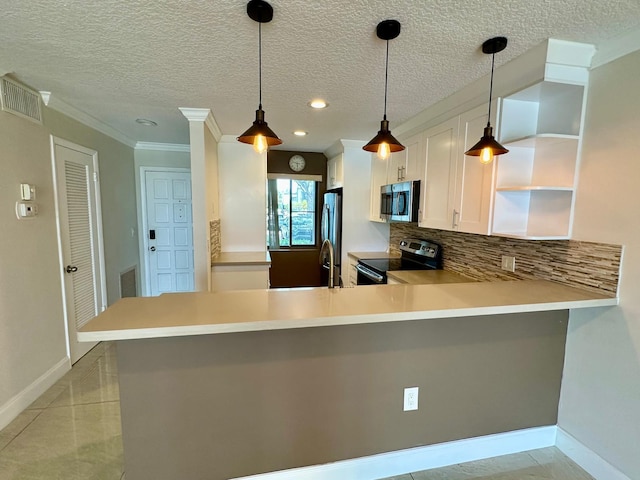 4822 Esedra Ct Unit 101, Lake Worth, FL 33467 - kitchen with stainless steel appliances, baseboards, open shelves, a peninsula, and a textured ceiling