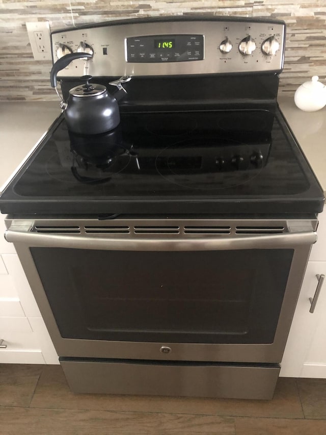 details featuring stainless steel electric range