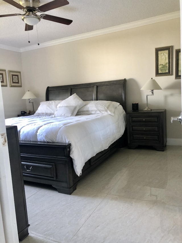 4822 Esedra Ct Unit 101, Lake Worth, FL 33467 - bedroom with ornamental molding, ceiling fan, and baseboards
