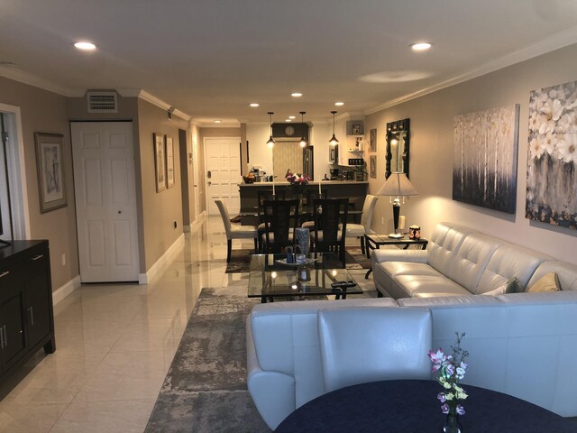 living area with tile patterned floors, expansive windows, ornamental molding, and recessed lighting