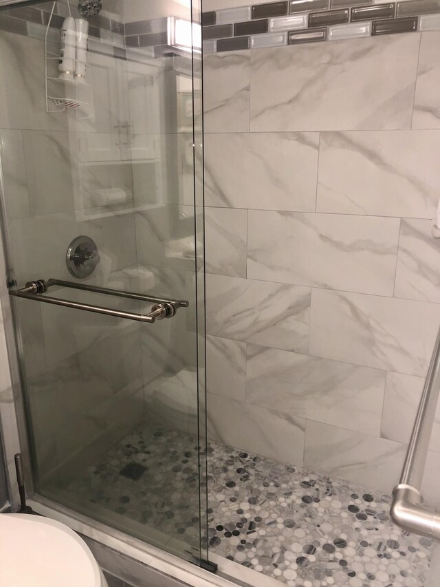 4822 Esedra Ct Unit 101, Lake Worth, FL 33467 - full bathroom featuring a stall shower and toilet