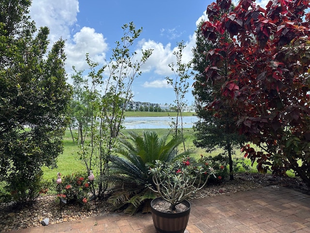 4822 Esedra Ct Unit 101, Lake Worth, FL 33467 - view of patio / terrace with a water view