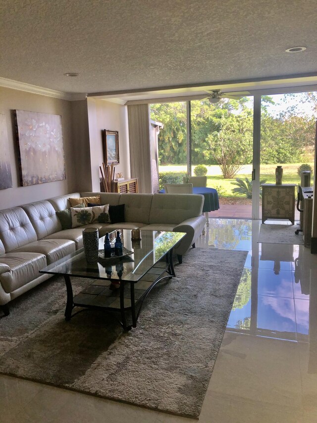 living room with recessed lighting, visible vents, crown molding, and baseboards