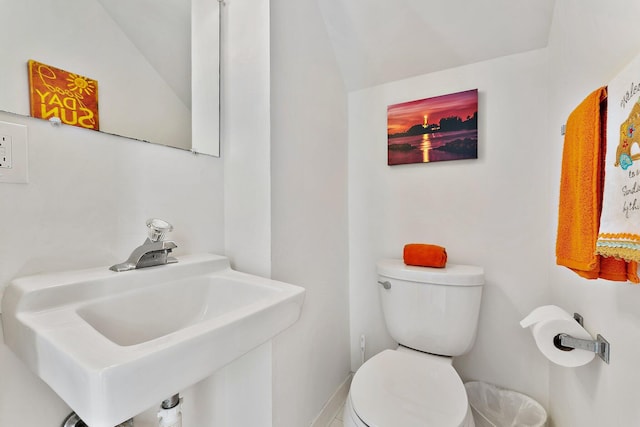 bathroom featuring a sink and toilet