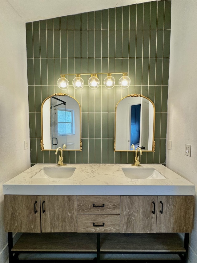 bathroom with double vanity and a sink