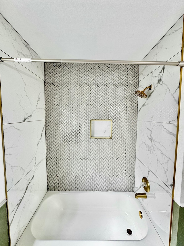 bathroom featuring  shower combination