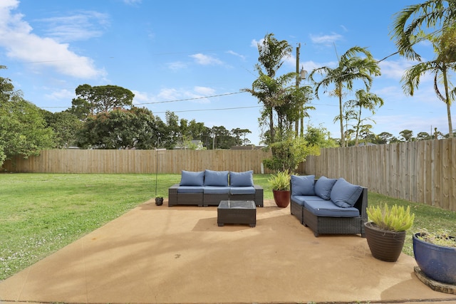 view of patio featuring a fenced backyard and outdoor lounge area