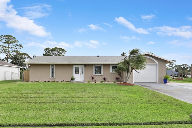 single story home with driveway, stucco siding, a garage, and a front yard