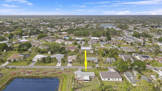 aerial view with a water view and a residential view