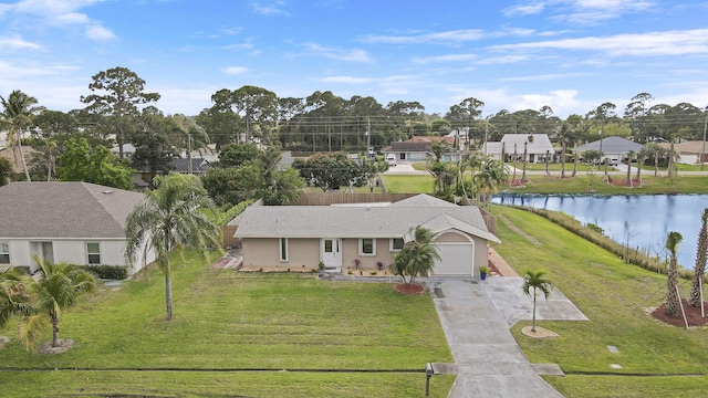 aerial view featuring a water view and a residential view