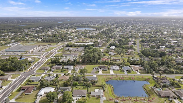 aerial view with a water view and a residential view