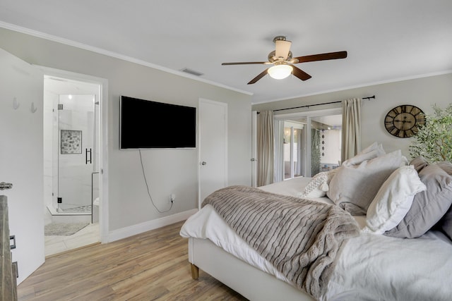 bedroom featuring ornamental molding, baseboards, visible vents, and light wood finished floors