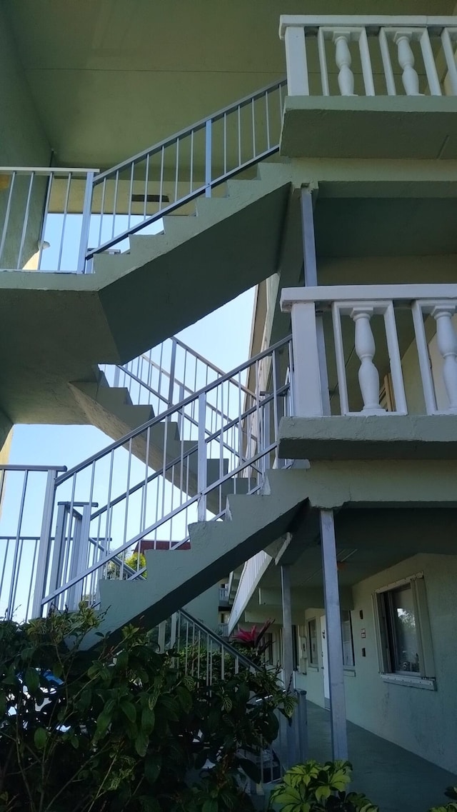 view of home's exterior with stairway