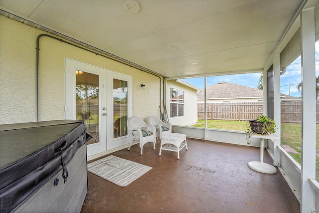 sunroom featuring french doors