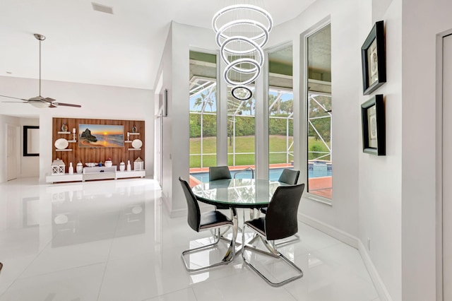 dining space with baseboards, visible vents, and a healthy amount of sunlight