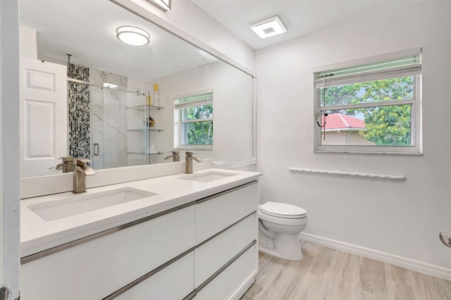 19035 Cypress Crik Ct, Boca Raton, FL 33498 - full bathroom featuring toilet, a sink, double vanity, and a stall shower
