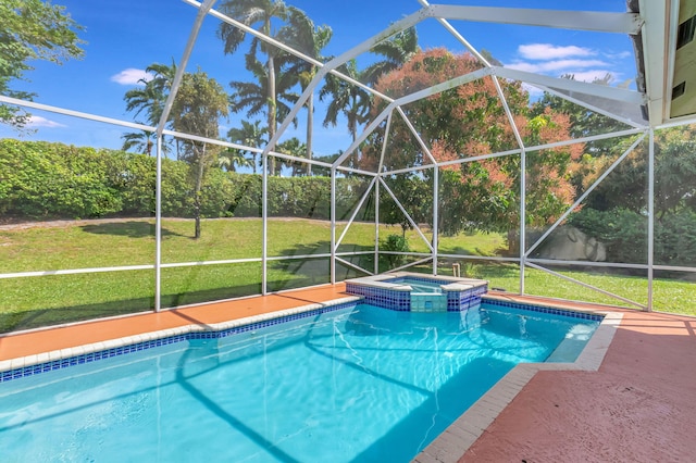 view of pool featuring a patio, a lawn, a lanai, and a pool with connected hot tub