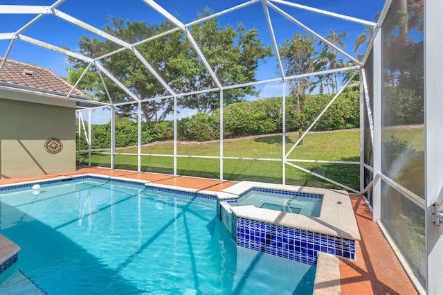 view of swimming pool with glass enclosure, a pool with connected hot tub, and a yard