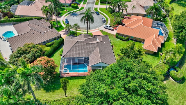 birds eye view of property with a residential view