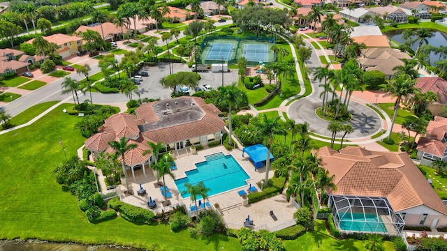 bird's eye view featuring a water view and a residential view