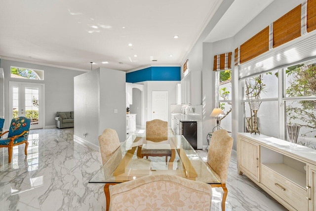 sitting room featuring french doors, baseboards, marble finish floor, and ornamental molding