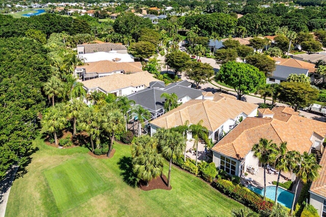 birds eye view of property with a residential view