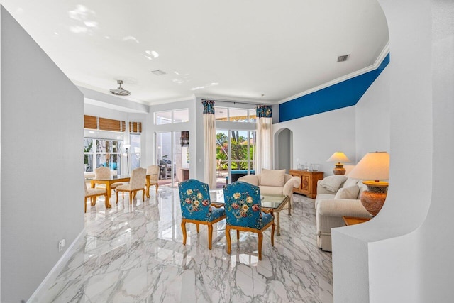 living area with visible vents, marble finish floor, crown molding, and baseboards