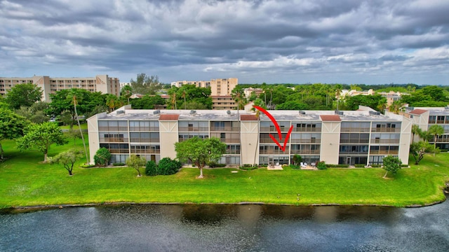 view of property with a water view