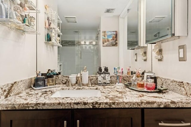 6562 Boca Del Mar Dr Unit 321, Boca Raton, FL 33433 - bathroom with vanity, a shower stall, and visible vents