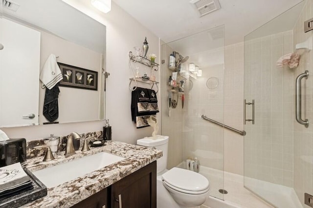 6562 Boca Del Mar Dr Unit 321, Boca Raton, FL 33433 - bathroom featuring visible vents, a shower stall, toilet, and vanity