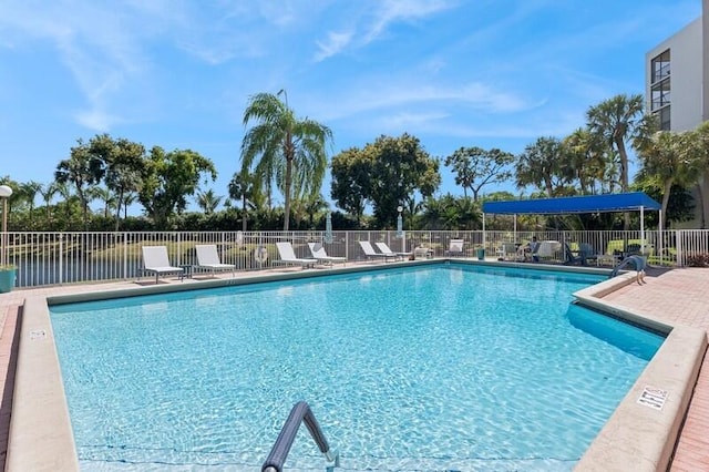 6562 Boca Del Mar Dr Unit 321, Boca Raton, FL 33433 - community pool with a patio and fence