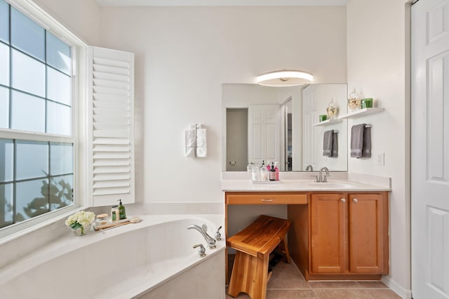 full bathroom with tile patterned flooring, vanity, and a bath