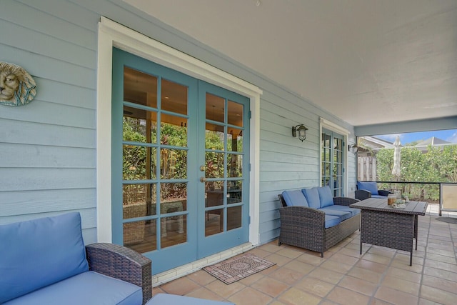 exterior space with outdoor lounge area and french doors