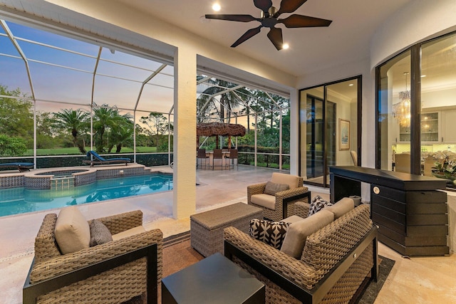 exterior space with a swimming pool, a jacuzzi, and ceiling fan