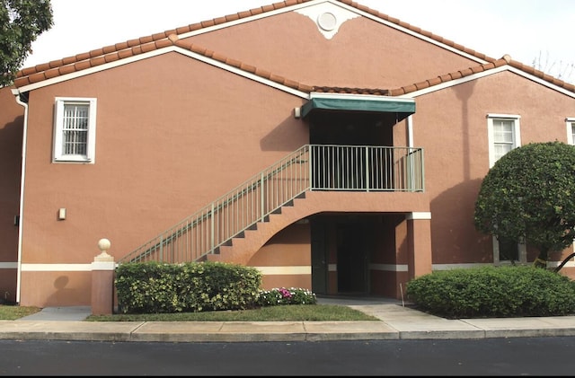 view of building exterior with stairs