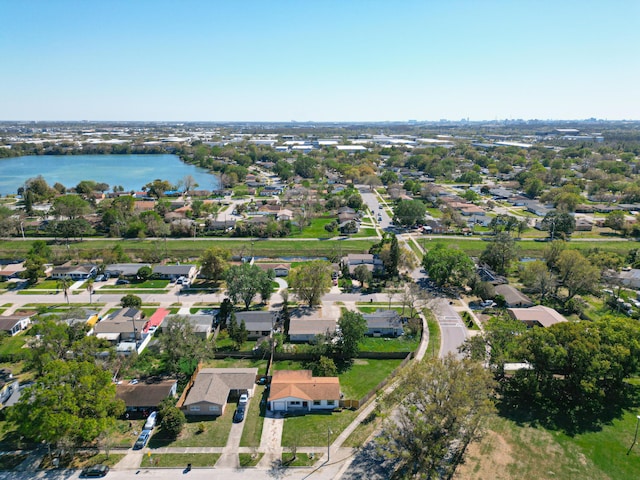 birds eye view of property featuring a water view and a residential view