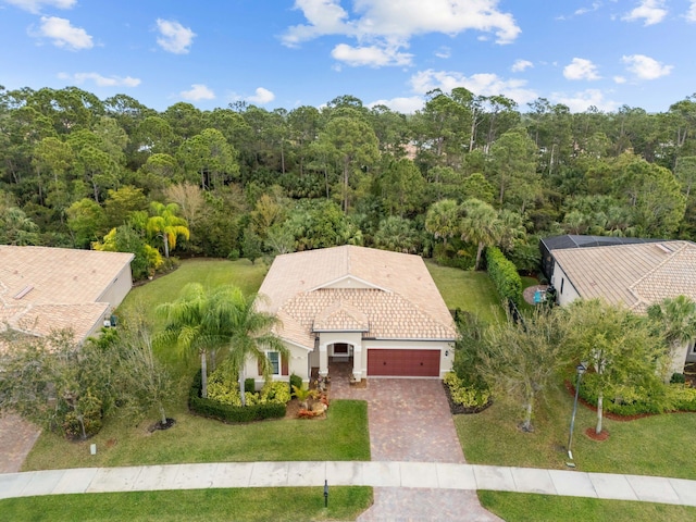 aerial view with a wooded view