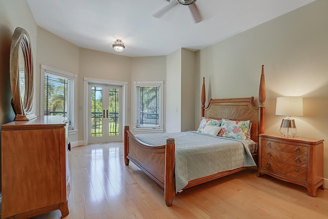 bedroom featuring a ceiling fan, french doors, baseboards, light wood-style flooring, and access to outside