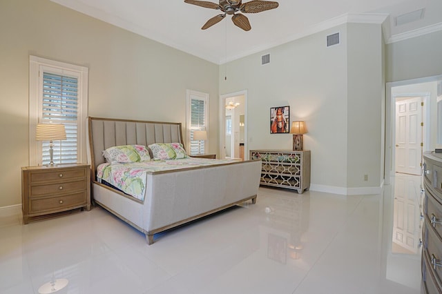 bedroom featuring a ceiling fan, baseboards, visible vents, and crown molding