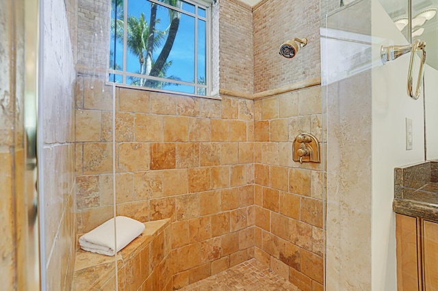 full bath featuring tiled shower