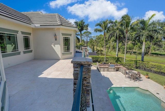 view of pool with a patio area, fence, and outdoor dining area