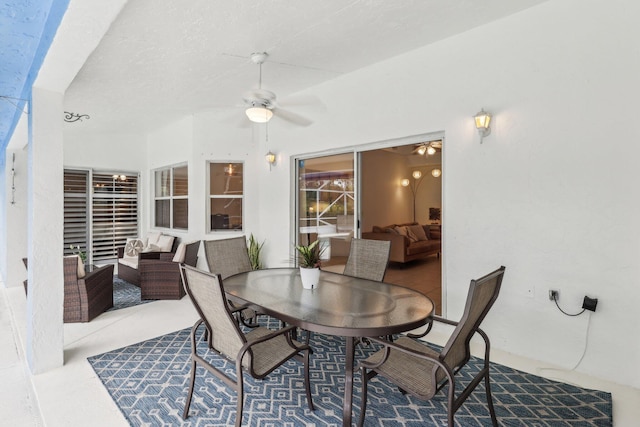 interior space with a ceiling fan, outdoor dining space, and an outdoor living space