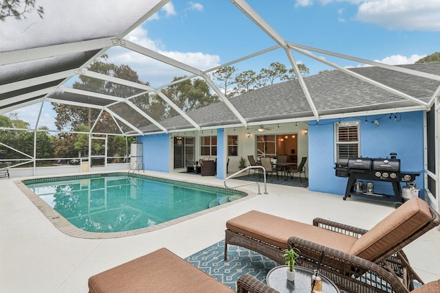 outdoor pool featuring a patio and a lanai