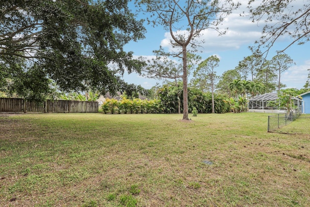 view of yard with fence