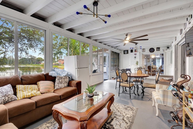 sunroom / solarium featuring a ceiling fan, beam ceiling, a water view, and plenty of natural light