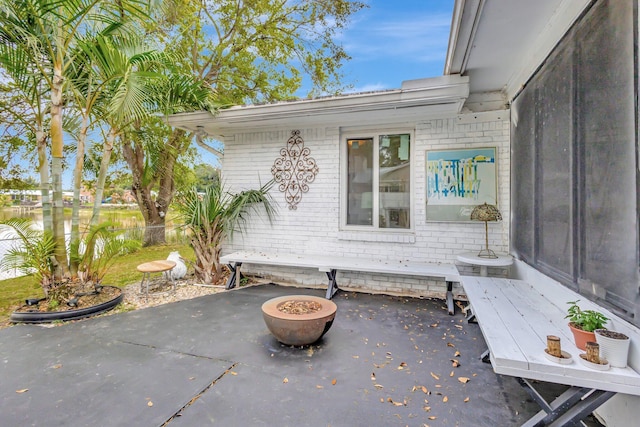 view of patio / terrace featuring fence