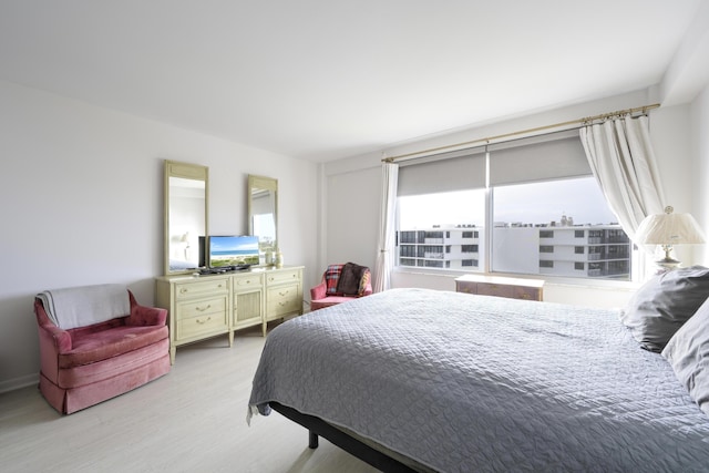 bedroom featuring light wood-type flooring