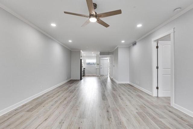 spare room with light wood-style floors, baseboards, ornamental molding, and recessed lighting