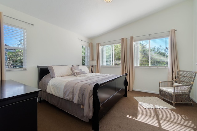 bedroom featuring carpet floors, baseboards, and vaulted ceiling