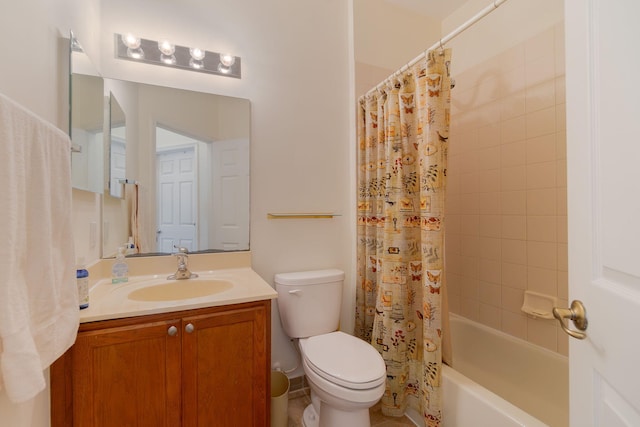 bathroom featuring shower / bath combo with shower curtain, toilet, and vanity